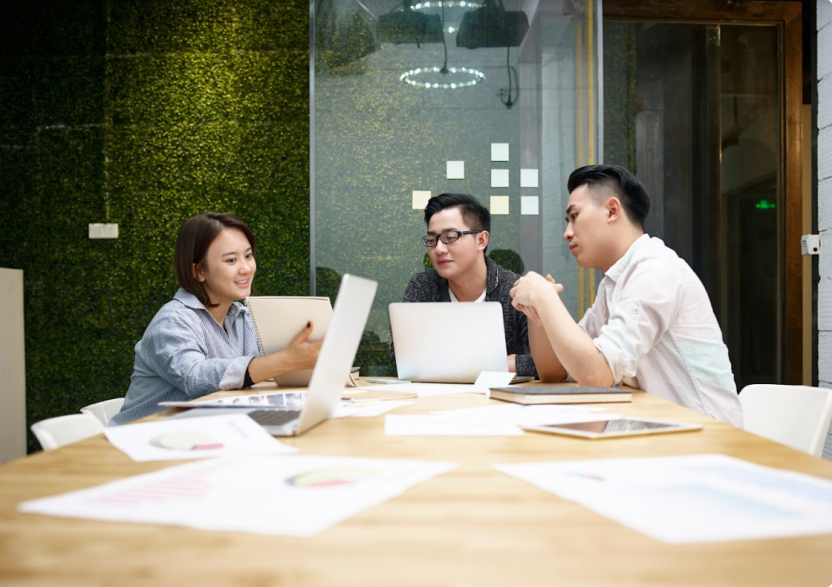 C2M3 properties employees in a meeting